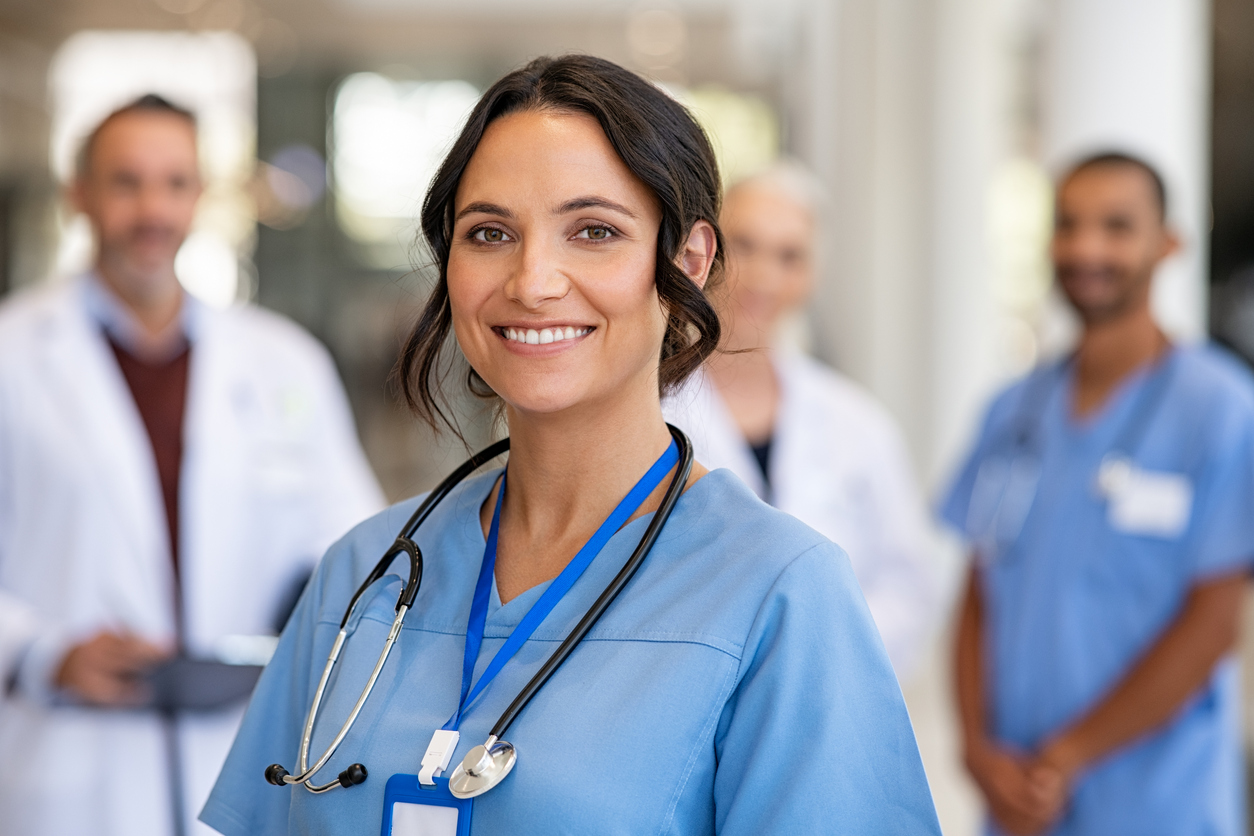 A person wearing blue scrubs and stethoscopes

Description automatically generated with low confidence